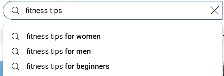 A search bar displaying autocomplete suggestions for "fitness tips," with related search queries for women, men, and beginners. The image highlights search behavior and common fitness-related queries.